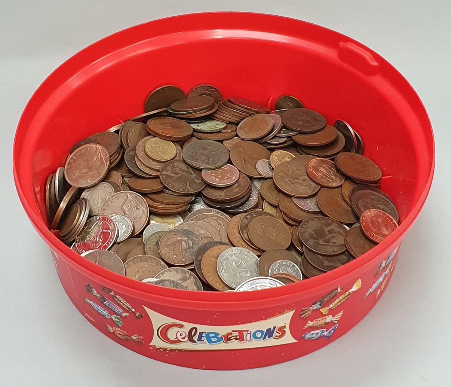 Red tub of assorted coinage