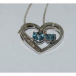 Blue topaz accent diamond 925 silver heart pendant