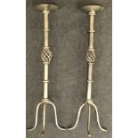 Pair of modern candle sticks each approx 73cm tall.