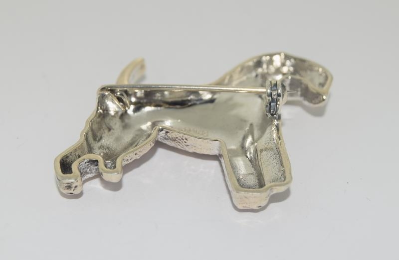 A silver dog brooch with glass eyes. - Image 3 of 3