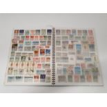 Multi-coloured stamp album for Greece.