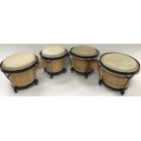 Two sets of bongo drums.