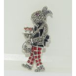 A silver and plique novelty brooch in the form of a rabbit barman.