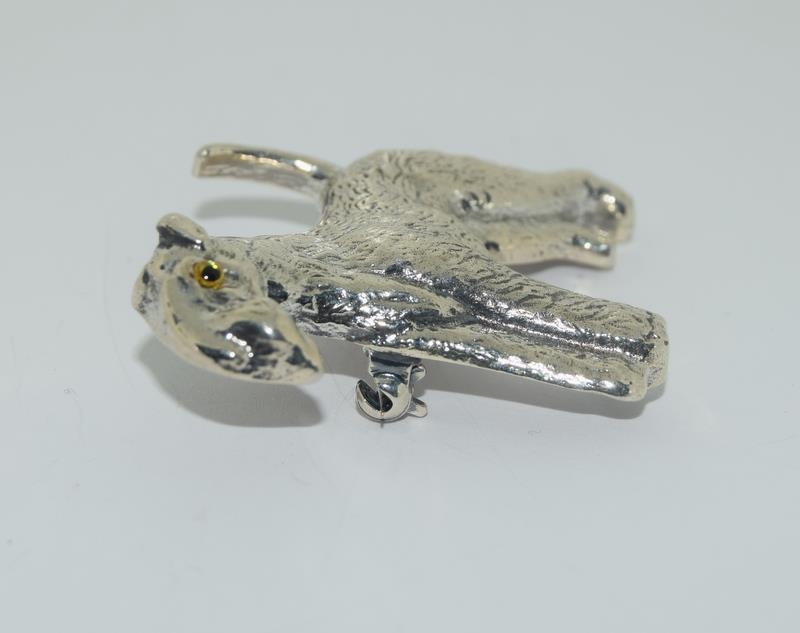 A silver dog brooch with glass eyes. - Image 2 of 3