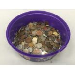 Mixed tub of assorted coins.