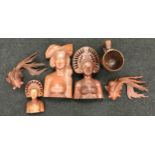 A collection of wooden African carvings.