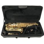 Ammoon child's saxophone with mouthpieces in case.