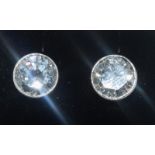 A pair of substantial silver and CZ stud earrings 5cts +