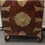 Oriental hard wood multi draw cabinet with brass fitments and lock 63x55x33cm