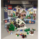 Lego set 10199 Winter Toy Shop with box and instruction manual. 99.9% complete. Missing two pairs of