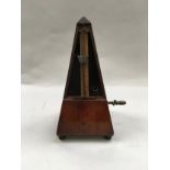 Vintage mahogany cased Metronome "Presto Allegro Andante" appears to be working.