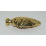 An 18ct gold plated perfume bottle in the form of a bird.