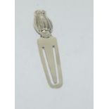 A silver owl bookmark.