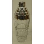 An Arty Deco style glass cocktail shaker with silver plated fittings.