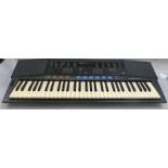 Yamaha PSR-47 electronic keyboard and stand