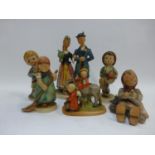 Collection of West German porcelain figures, mostly Goebel. 6 in all.