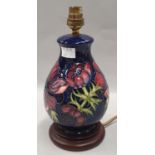 Moorcroft table lamp in the Clematis pattern.
