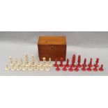 Carved and stained chess set 32 pieces in wooden box.