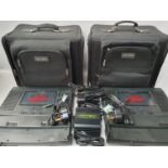 Two Joytech gaming system monitors in carry bags with power leads.