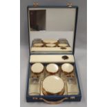 Cased ladies travel set complete with glass bottles.