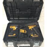 Dewalt case containing 2 cordless drills. (ref 6)