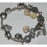 Bracelet marked as Pandora with charms ref 173