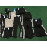Collection of Adidas sports clothing size 8 new with tags (REF 78).