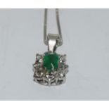Emerald and cz silver pendant