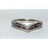 A wishbone silver 925 ring with pink gem stones. Size P (Ref DR3)