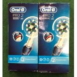 2 x Oral-B pro 2 boxed toothbrushes (REF 23).