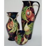 Moorcroft "Queens Choice" large ewer 27cms high together with a matching vase 19cms high and a small