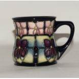 Moorcroft "Violet" mug by Julie Auden & Joanne Mountford fully marked & signed to base, boxed.