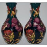 Moorcroft vase "Carolina Moon" marked to base trail 13.5" high together with matching vase dated