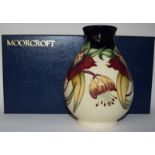 Moorcroft "Anna Lily" vase, 23cms high, fully marked & signed to base 1998 boxed.