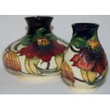 Moorcroft "Anna Lily" squat vase 10cms high together with one other 9.5cms high, both fully marked &