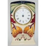 Moorcroft Clock in the Anna Lily design by N. Sleeney 16cms high, fully marked & signed to base.