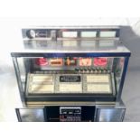 RARE VINTAGE "SEEBURG CONSOLETTE" WALLBOX JUKEBOX. This is sold complete with coin mech and original