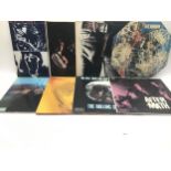 THE ROLLING STONES VINYL LP RECORDS. This selection includes 8 disc?s and have titles to include