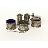 Silver condiments set with some blue liners