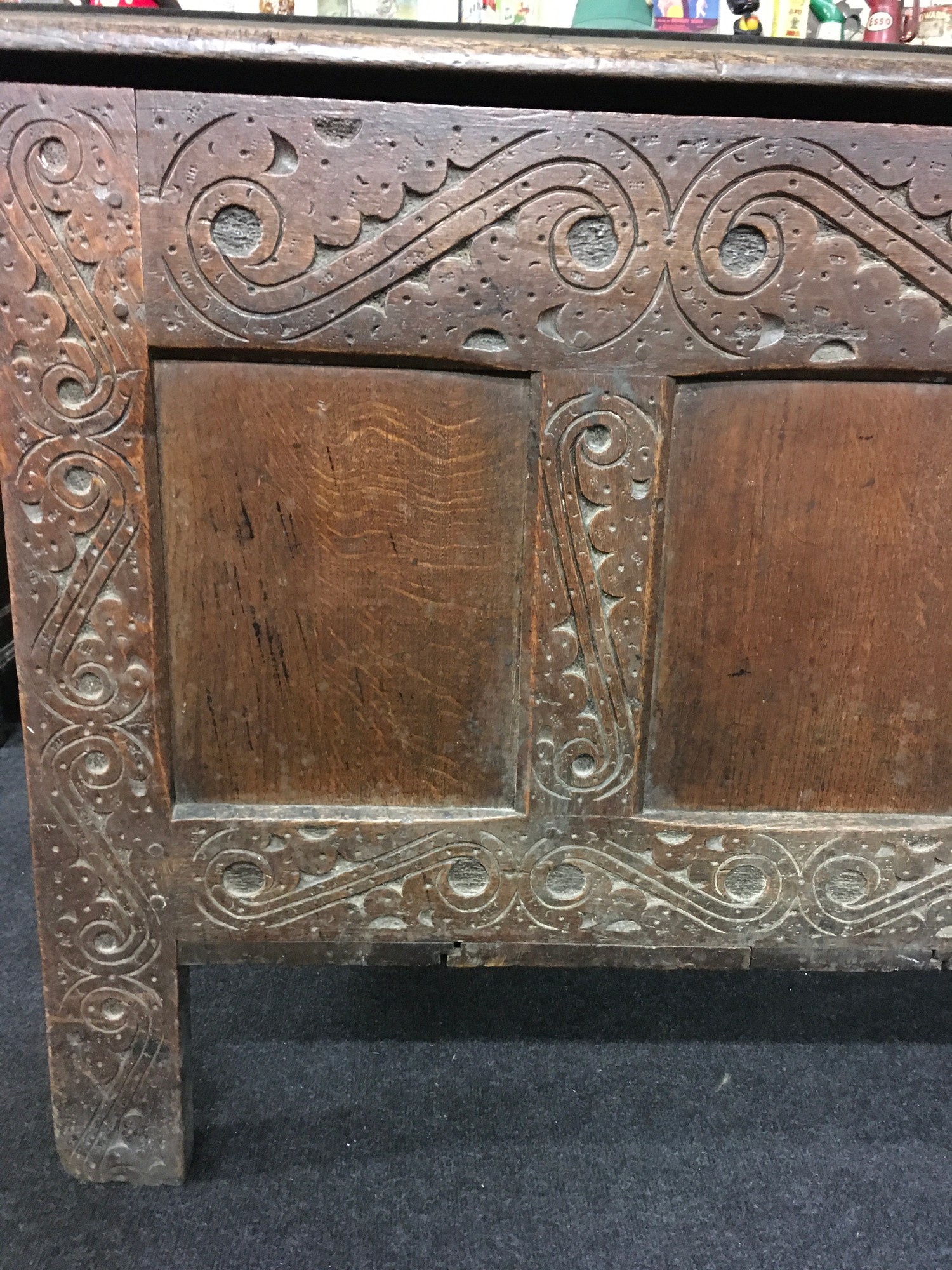 Good elm coffer with carved panels and original metal fitments solid plank top missing part of - Image 8 of 8