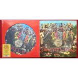 THE BEATLES PICTURE DISC ALBUMS. 2 Copies here of SGT. Pepper's Lonely Hearts Club Band picture disc