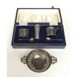 Sterling silver condiment set boxed together a pierced small silver twin handled bowl