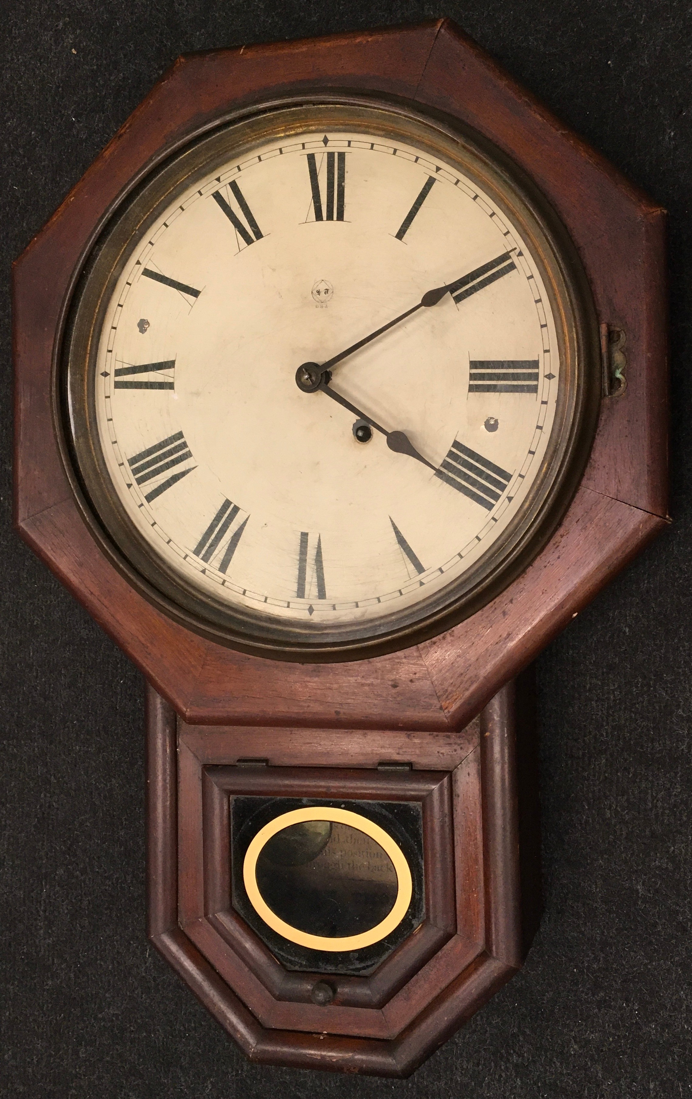 A wooden wall clock.