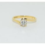 Diamond solitaire 0.33points in 18ct gold twist ring.
