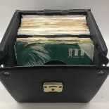 BOX CONTAINING BEATLES SINGLES. A total of 48 single vinyl records released by the Beatles here