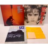 COLLECTION OF U2 ITEMS. Here we have 2 vinyl albums ?War and Under A Blood Red Sky? with a rare ?