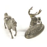 Silver plate sculpture of a charging stag together a prancing horse