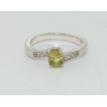A 925 silver ring with green stone to centre, Size P