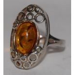 A large silver 925 and amber ring. Size R