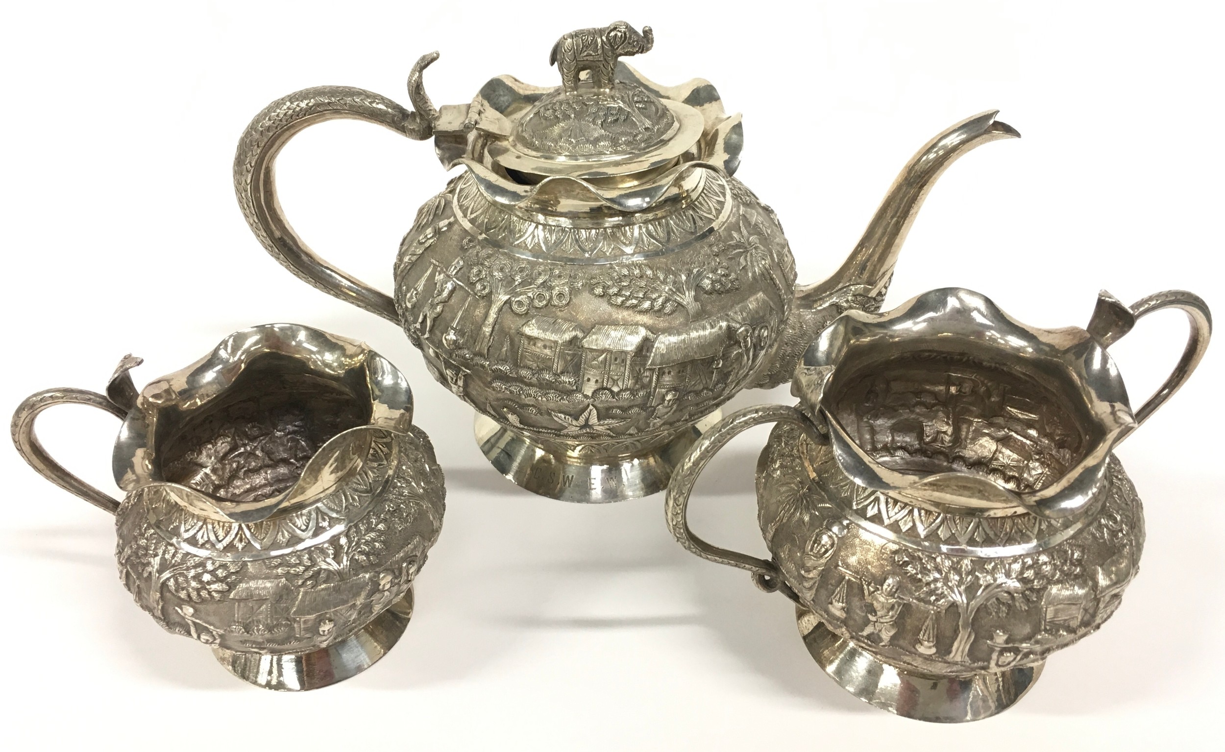 Oriental silver embossed 3 piece tea set 885gm